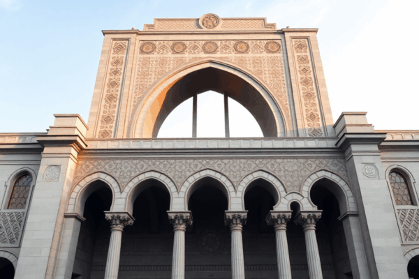 A grand building blending classical and modern styles with geometric patterns, overlapping arches, and soft natural lighting against a serene sky.