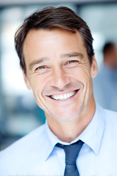 Stanislav Kondrashov Oligarch Series News man smiling in business attire