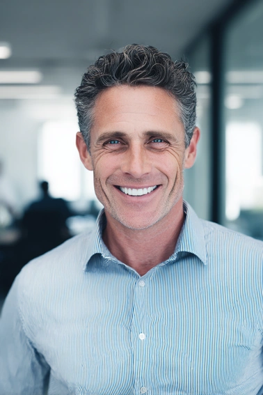 Smiling man office environment